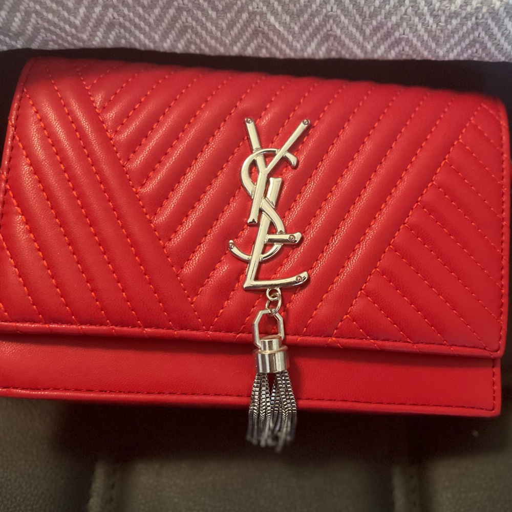 Red clutch crossbody with silver hardware